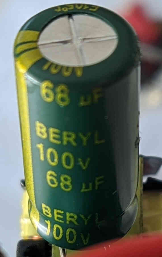 The 100V, 68uF output filtering capacitor.