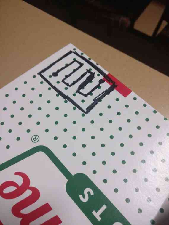 A tag inside a donut box
