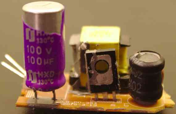 Side view of main PCB, with bulk capacitor model number
