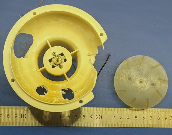The original impeller and (damaged) fan housing